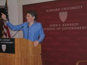 Photo of Jamie speaking at Harvard